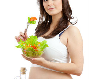 Pregnant woman eating healthy