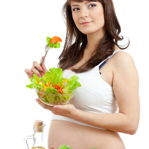 Pregnant woman eating healthy
